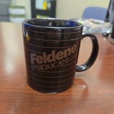 Listing image for Pfizer Feldene Marketing Promo Pharmaceutical Mug Coffee Cup