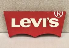 Listing image for Vtg 90s LEVI'S Red Tab Logo Hanging Advertising Retail Store Display Sign 15.75"
